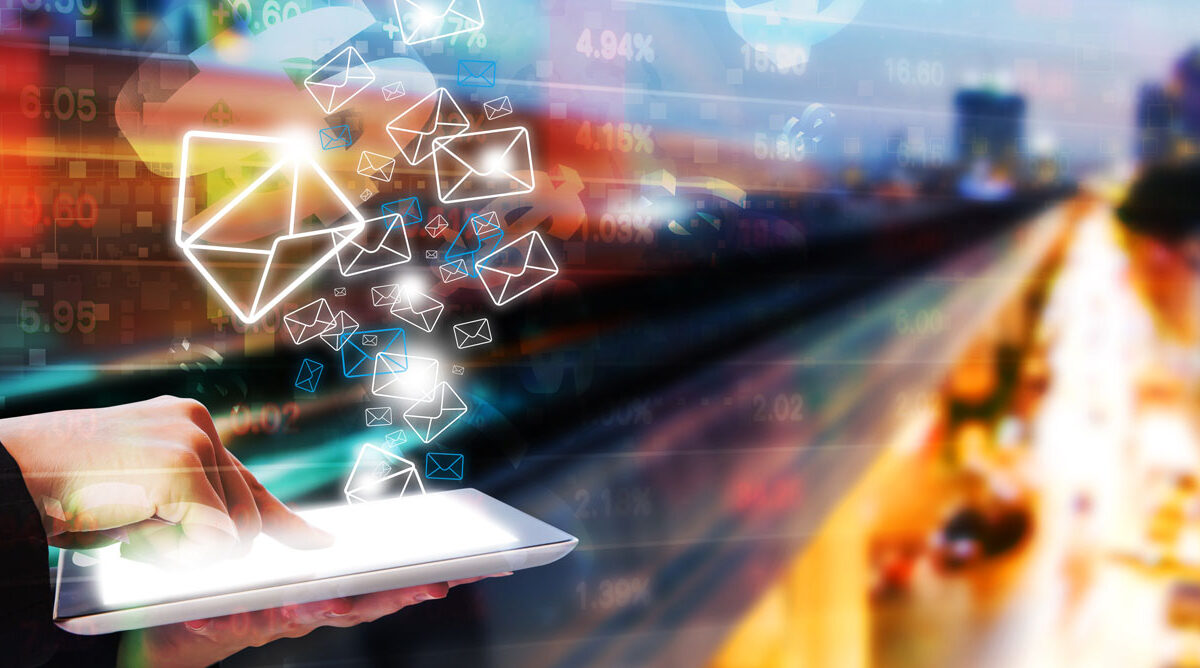 photo illustration of tablet sending email