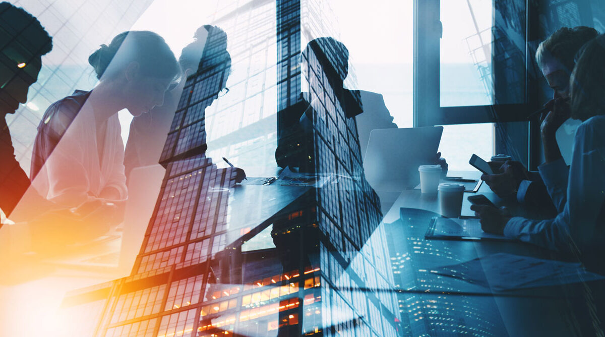 people working at conference table