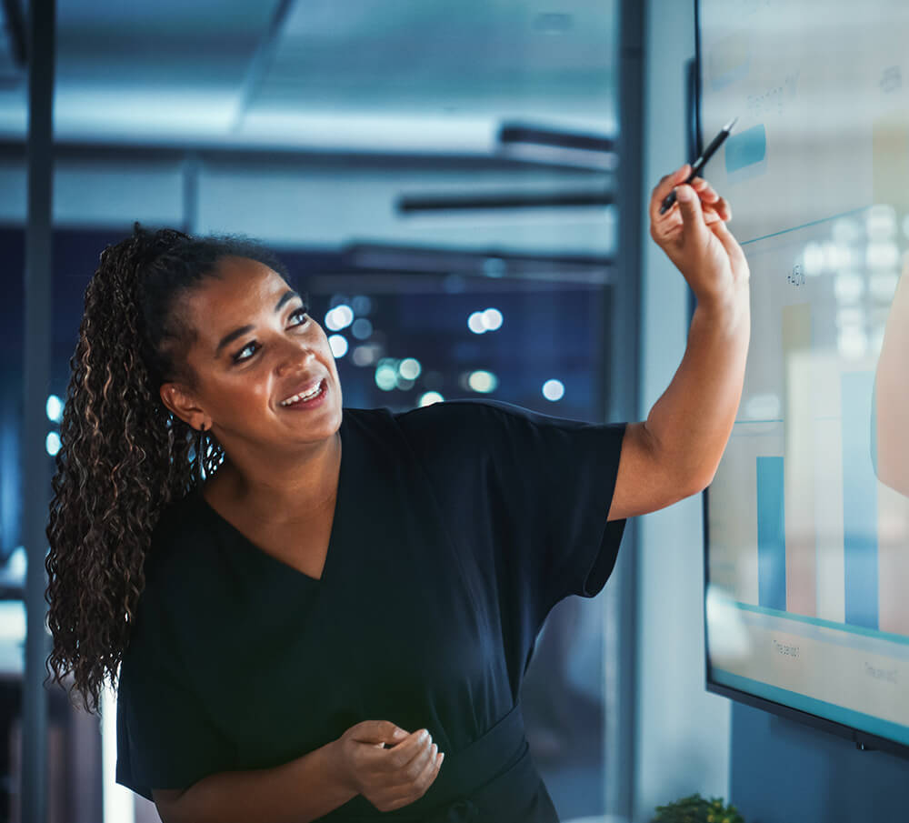 Professional presenting a report on a screen Professional presenting a report on a screen