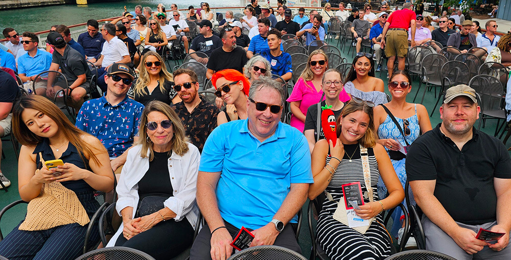 The Pepper Group team on a boat during the summer outing