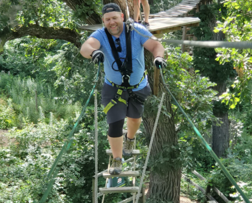Brian and Joe going through a ropes course Brian and Joe going through a ropes course
