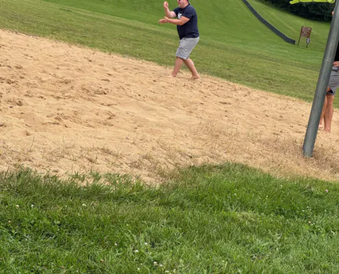 Brian playing volleyball